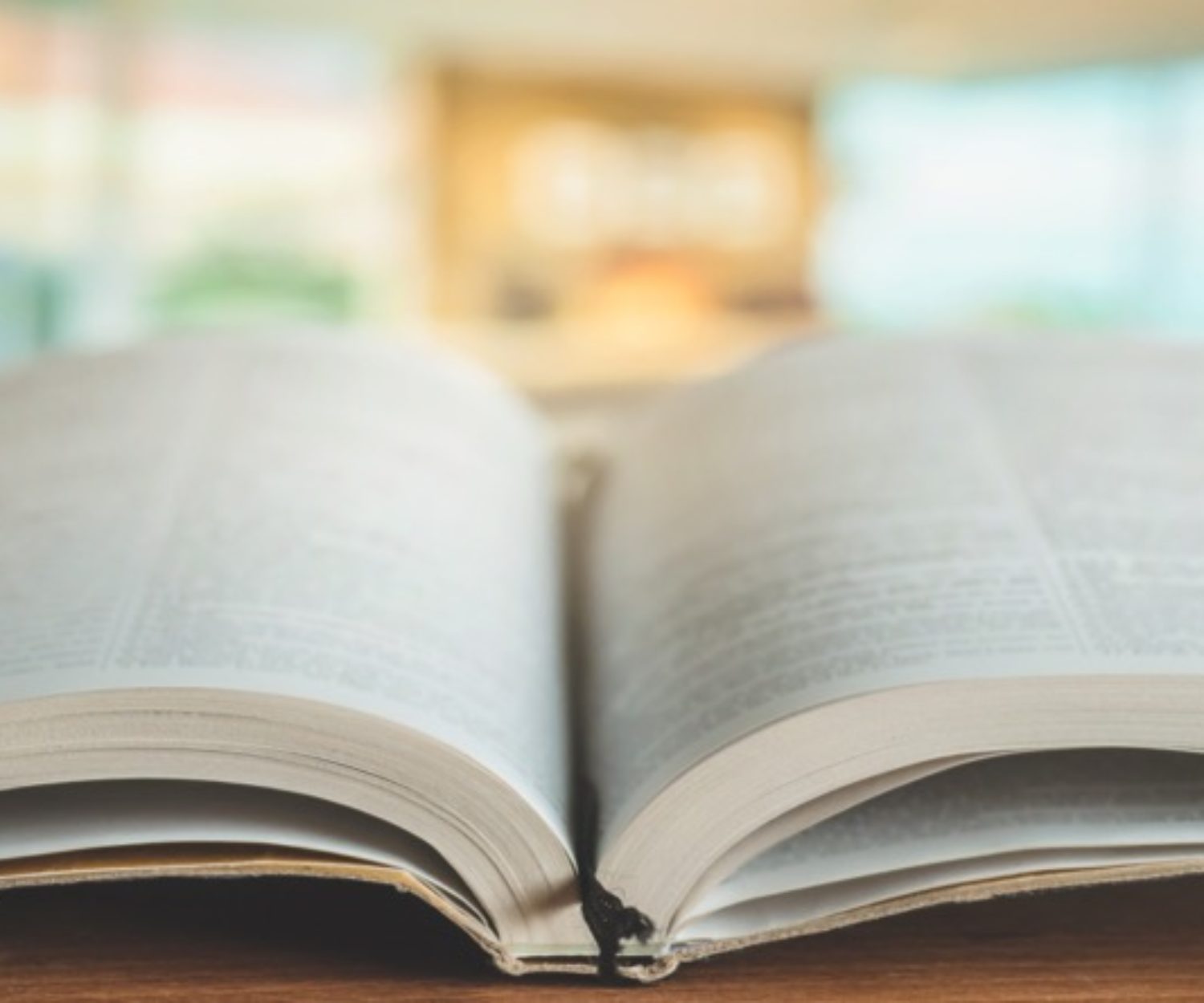 Bible on a background of home interior. The concept of faith, spirituality and religion. Peace, hope, dream concept